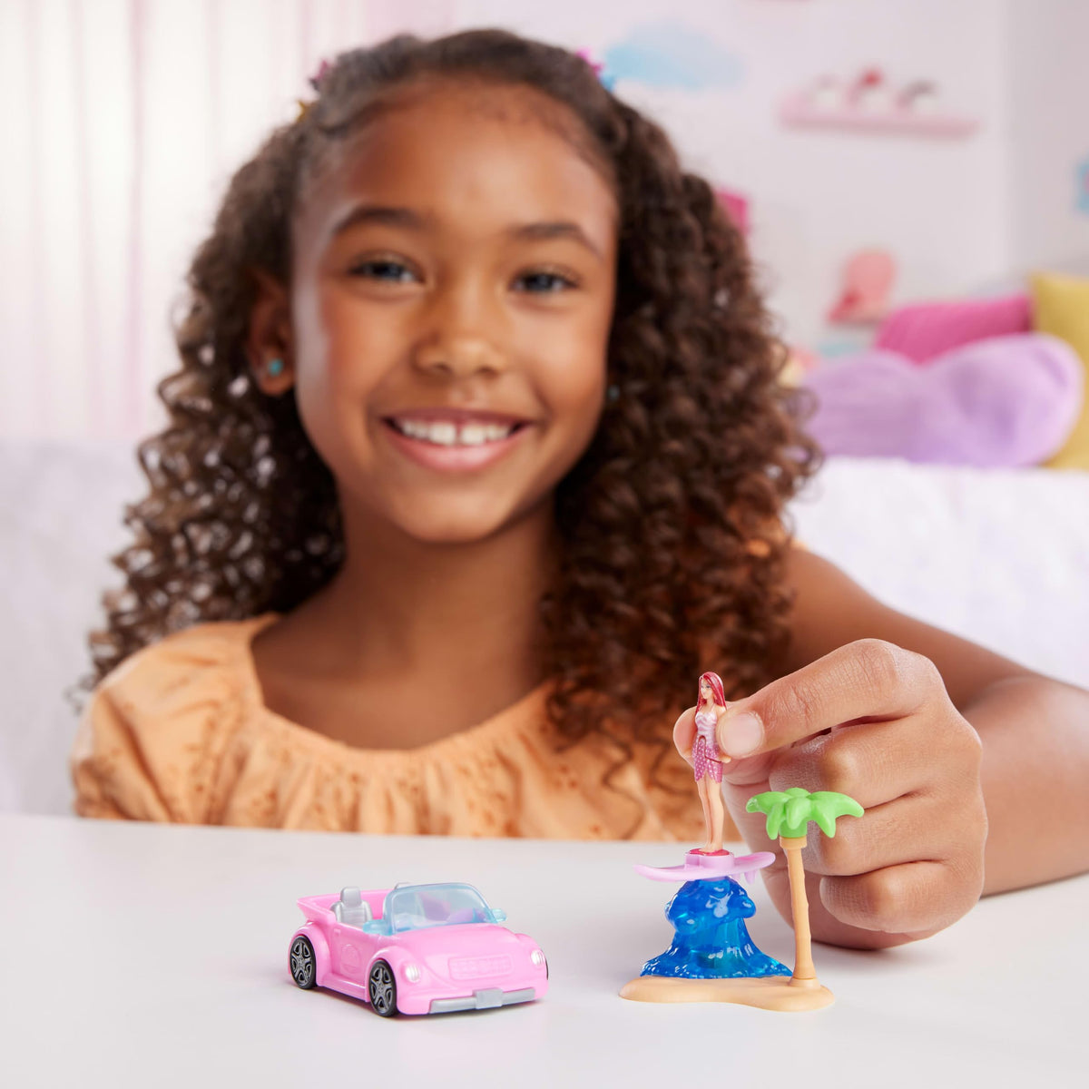 Barbie Mini BarbieLand Doll & Toy Vehicle Set, 1.5-inch Barbie Doll & Beach Convertible with Color-Change, Plus Beach Accessory, JCR35
